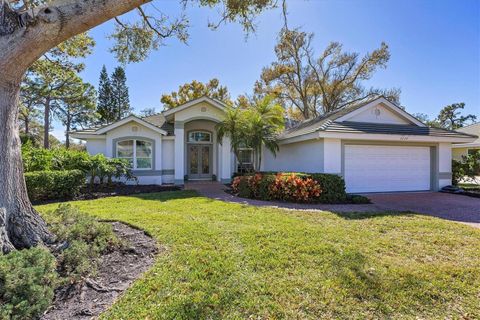 Photo of 8684 Woodbriar Drive, Sarasota, FL 34238 (MLS # A4679569)