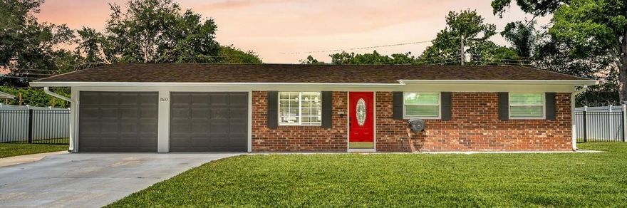 Beautifully updated and move-in ready, this central Lakeland home offers modern comfort, thoughtful upgrades, and exceptional indoor–outdoor living. A clean brick exterior, manicured landscaping, and inviting front entry create strong curb appeal from the moment you arrive. 
Inside, a bright and open layout welcomes you with a warm living area featuring rich flooring, abundant natural light, and an electric fireplace that adds both style and comfort. The contemporary kitchen serves as a true centerpiece, showcasing granite countertops, stainless steel appliances, a stylish tile backsplash, and a breakfast bar that flows seamlessly into the dining area—ideal for both everyday living and entertaining.
The primary suite is a private retreat, highlighted by a well-appointed bedroom and a spa-inspired bathroom with a sliding barn door entry, freestanding tub, glass-enclosed shower, dual sink vanity, and elegant finishes. A spacious walk-in closet with custom organization adds both function and luxury. Additional bedrooms are well sized and versatile, perfect for family, guests, or flexible living needs.
A thoughtfully designed laundry room offers generous storage, upgraded shelving, and polished finishes that make daily routines effortless.
One of the home’s most impressive features is the expansive enclosed patio, designed for true indoor–outdoor living. This space includes a fully equipped outdoor kitchen and grilling station with stainless steel appliances, multiple cooking surfaces, and ample counter space. Flowing into a comfortable lounge and entertainment area, it creates the perfect setting for gatherings, game days, or quiet evenings at home. The screened patio overlooks a private, fenced backyard, offering space to relax and enjoy the Florida lifestyle year-round.
With modern updates throughout, flexible living spaces, and standout outdoor amenities, this home delivers a rare combination of style, comfort, and everyday enjoyment.