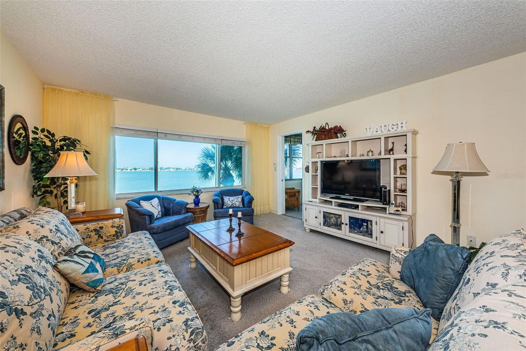 Photo of 4750 Cove Circle #303, St Petersburg, FL 33708 (MLS # TB8503442)