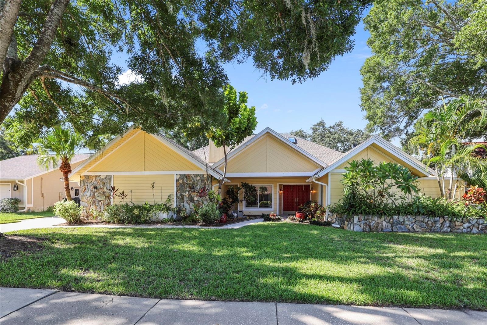 Welcome to this beautifully updated 4-bedroom, 2-bathroom pool home, ideally located on a quiet, friendly cul-de-sac just 25 minutes from the airport and close to both Northwood Commons and charming Safety Harbor. With a new roof installed in 2024, this home combines peace of mind with modern comfort.
Inside, tall ceilings create a beautiful sense of openness and flow throughout the open-concept kitchen, living, and dining areas. The kitchen, fully renovated in 2022, features all new stainless steel appliances, a slide-out pantry, built-in spice storage, a breakfast bar, and a reverse osmosis system under the sink. The separate utility room offers added convenience for daily living.
The living room centers around a cozy fireplace with a pull-out TV—perfect for relaxing or hosting movie nights. The spacious layout offers a split floor plan, providing privacy for all bedrooms.
Step outside to your own private oasis: a sparkling saltwater pool surrounded by an open lanai and a custom outdoor bar, ideal for entertaining guests or enjoying quiet weekends at home. A two-car garage completes this well-maintained and thoughtfully designed home.
Move-in ready and located in a welcoming neighborhood, this home offers the perfect blend of comfort, style, and convenience.
