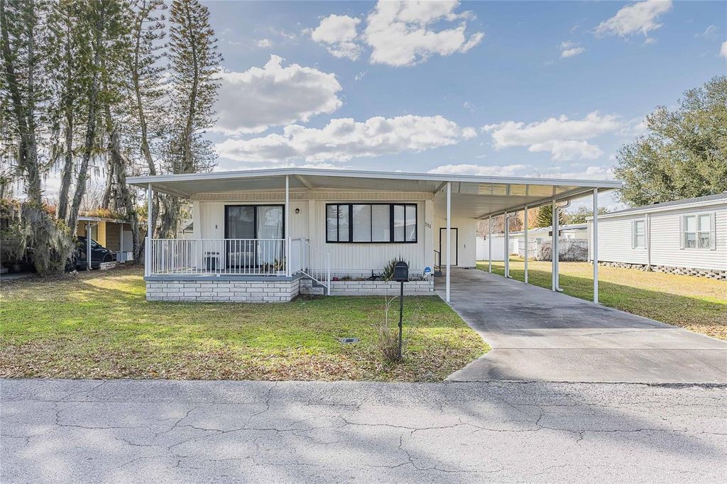 Photo of 511 Lazy Lake Drive W, Lakeland, FL 33801 (MLS # TB8477313)