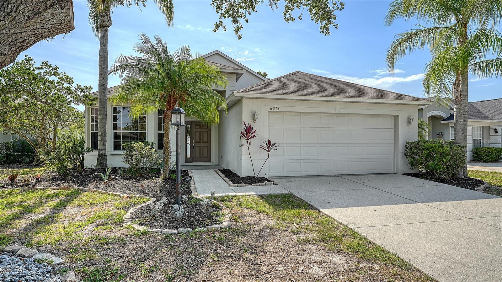 Welcome to your dream home in the heart of Lakewood Ranch. Located in the highly desirable community of Greenbrook, this beautifully maintained 3-bedroom, 2-bathroom pool home offers the perfect blend of comfort, style, and convenience. Enjoy the Florida lifestyle with your private screened lanai, heated pool, and spa—ideal for relaxing afternoons or entertaining friends and family. Inside, you'll find a freshly painted, light and bright open floor plan featuring a spacious kitchen, formal dining area, and a versatile den/office. The split-bedroom layout offers privacy for the primary suite, creating a peaceful retreat. This home is just minutes from Lakewood Ranch Main Street, Waterside Place, UTC, top-rated schools, hospitals, shopping, dining, and only 20 minutes to downtown Sarasota and the beautiful Gulf beaches. You'll love the nearby Greenbrook Adventure Park, playgrounds, sports fields, dog park, and scenic walking and biking trails throughout the community. Additional features include a two-car garage with extra storage and walking distance to A-rated elementary and middle schools. Don’t miss this opportunity to enjoy the best of Florida living. Schedule your private tour today!