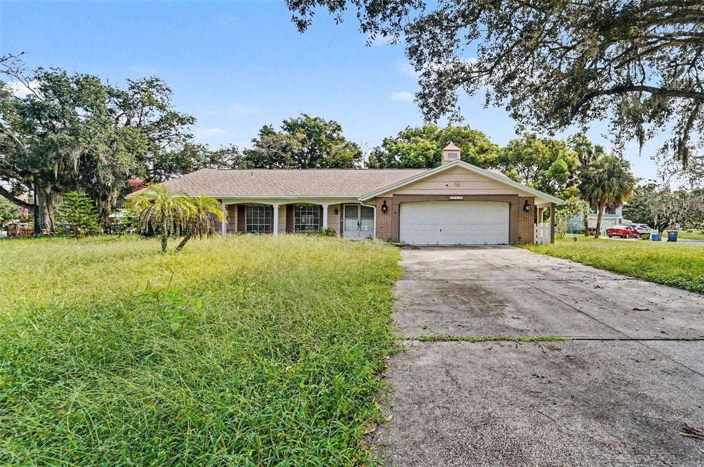 Photo of 12511 Stone House Loop, Hudson, FL 34667 (MLS # TB8546443)
