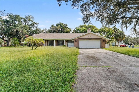 Photo of 12511 Stone House Loop, Hudson, FL 34667 (MLS # TB8546443)