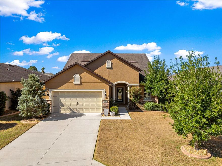 Wake up to breathtaking golf course views from this highly sought-after Martin Ray model, perfectly positioned on a premium lot overlooking the 6th hole tee box in the gated 55+ community of Stone Creek.
This beautifully maintained 3-bedroom, 3-bath home with flex room and loft offers the ideal blend of luxury, comfort, storage, and functionality.
Step inside through the new glass front door inset and experience bright neutral tones, abundant natural light, and elegant finishes throughout. The open-concept kitchen is a true showpiece, featuring quartz countertops, a large island with a striking stone accent base, custom-designed pantry, upgraded Kitchen Aid stainless steel appliances, cabinet pull-outs, and ample storage — perfect for entertaining.
The spacious living area is anchored by an electric fireplace and flows seamlessly through glass sliders to the screened-in lanai, where you can relax and enjoy peaceful golf course views year-round.
The renovated primary suite is a private retreat, offering a custom walk-in closet and a spa-inspired bathroom with a Roman-style step-in shower. Beautiful plank flooring, crown molding and Plantation shutters add timeless sophistication throughout the home.
Upstairs, the versatile loft includes its own secondary AC zone controller for enhanced energy efficiency — this amazing space is ideal on so many levels - use it for guests, an adult child attending school, a hobby space for artists or crafters, or perhaps a man-cave theater area, plus it has a plethora of extra storage!
Additional highlights include: extended garage with 4-foot bump-out, perfect for extra storage or a golf cart, recently repainted exterior and interior, decorative concrete curbing and river rock ground cover, the additional flex room and the premium golf court lot.
Located in the resort-style, active adult community of Stone Creek, residents enjoy gated security and world-class amenities designed for vibrant 55+ living.
This is more than a home — it’s a lifestyle!
Schedule your private showing today and experience golf course living at its finest!