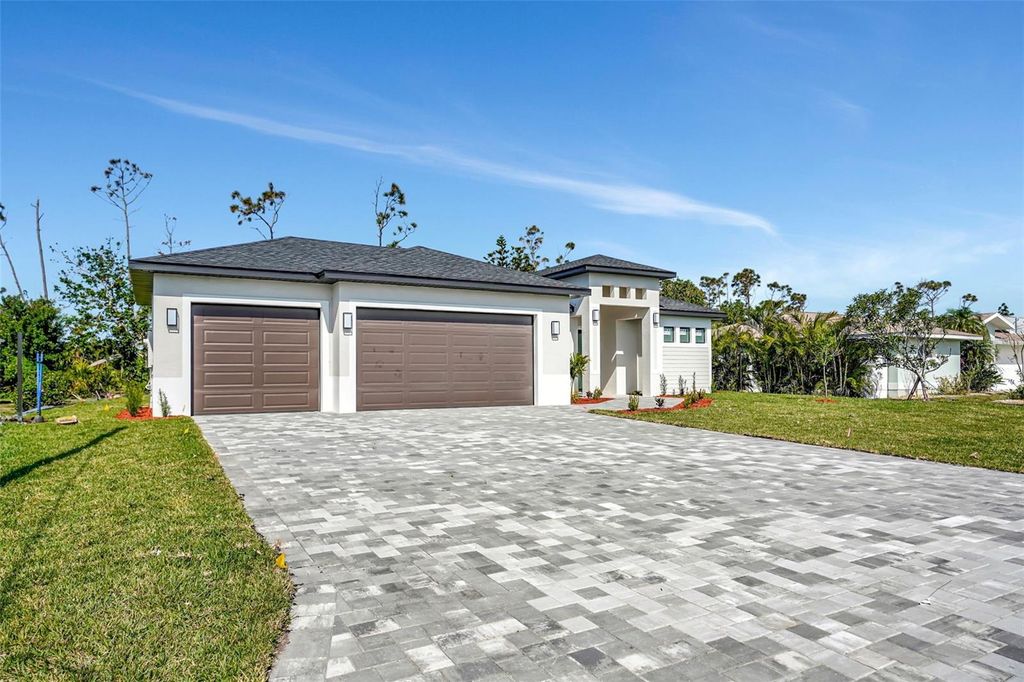 Photo of 212 Fairway Road, Rotonda West, FL 33947 (MLS # C7518727)