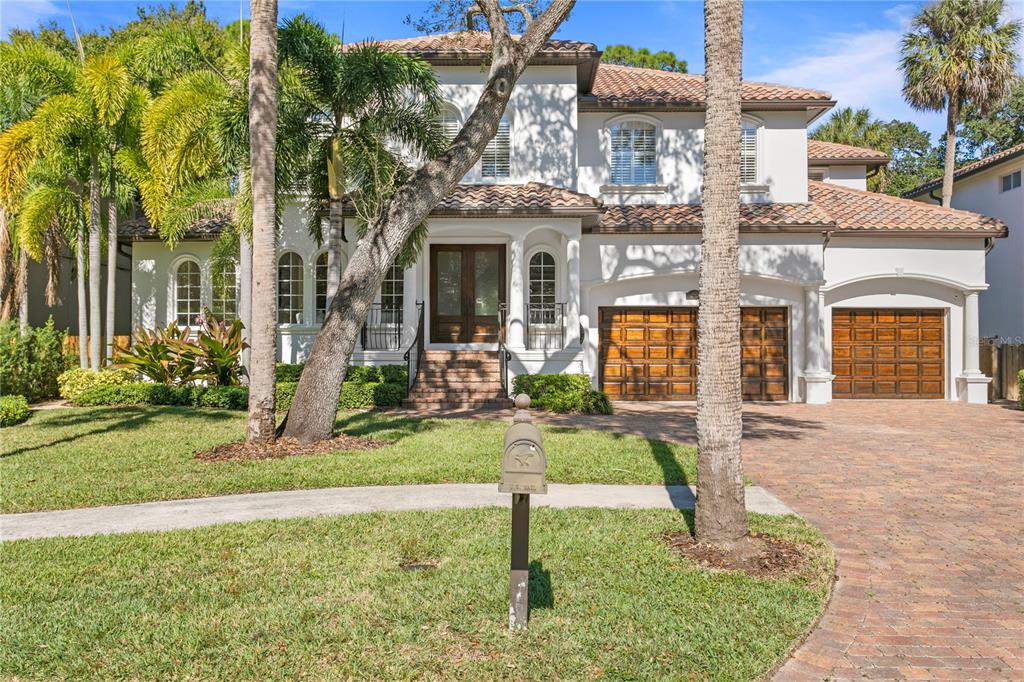 Located in South Tampa's popular Sunset Park neighborhood, this well-appointed pool home features 5 spacious bedrooms, 4.5 baths, 1st and 2nd floor laundry rooms, large saltwater pool with spa, paved entertainment areas, low maintenance turf backyard and tricked-out 3 car garage. The open floorplan offers 4,400 sf of living spaces with formal living/dining rooms, a private office, spacious eat-in kitchen with Thermador appliances, pantry, wine room, and a generous first floor guest suite. The second floor features an exceptional primary suite with sitting room, 2 walk-in closets, luxury bath and a private outdoor balcony overlooking the pool and lush tropical landscape. An additional private suite, 2 bedrooms sharing a Jack & Jill bath and a 2nd floor laundry room completes the upstairs. Located just minutes to popular public & private schools, Tampa International Airport, Downtown, both Bay Bridges, shopping and dining. This home has it all! Room Feature: Linen Closet In Bath (Primary Bathroom).