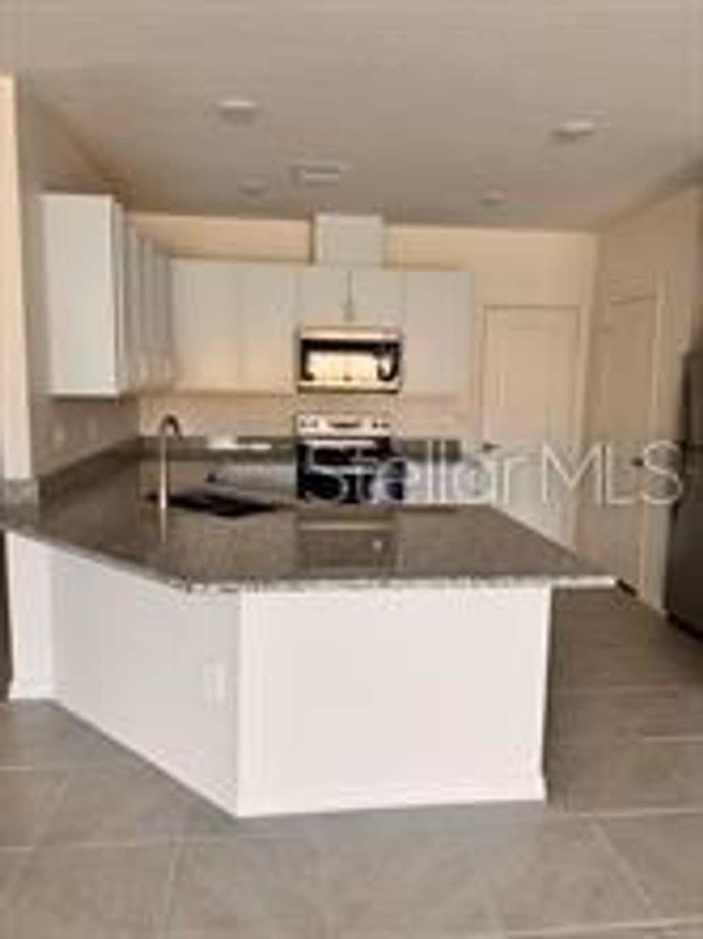 Photo of 9282 Westside Hills Drive, Davenport, FL 33896 (MLS # S5145450)