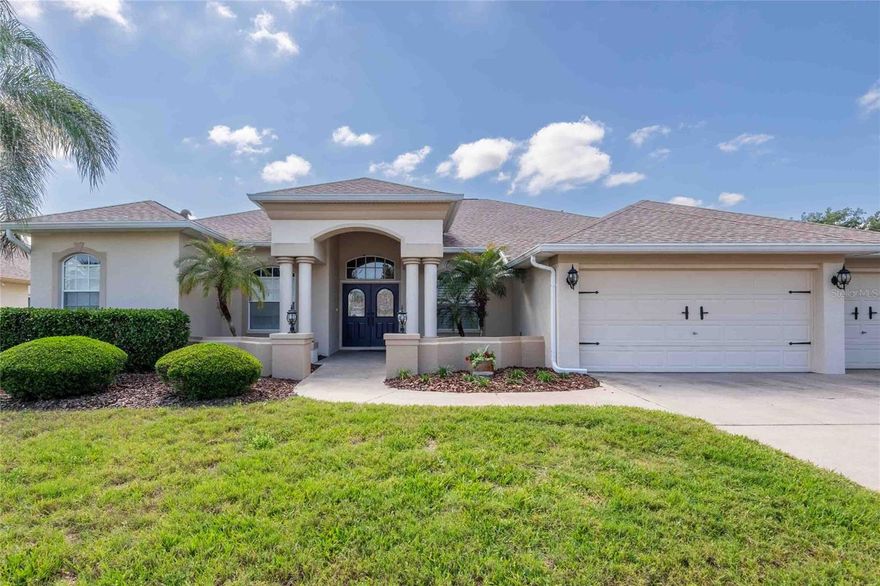 Welcome to your perfect Florida retreat in the highly sought-after The Groves Golf & Country Club—a gated, active 55+ golf community where resort-style living meets everyday comfort. Ideally positioned on the golf course with picturesque views of the 16th tee, this custom-built, one-owner estate home has been meticulously maintained and offers the ideal blend of elegance, space, and low-maintenance living. Enjoy additional scenic fairway views, along with peaceful pond vistas that enhance the tranquil setting.

This beautifully designed residence features 3 bedrooms plus a dedicated den/office, 2 full bathrooms, and a spacious 3-car garage. Step inside to discover soaring ceilings, crown molding, and a desirable split-bedroom floor plan that provides both privacy and functionality. The light-filled living spaces create an inviting atmosphere perfect for relaxing or entertaining.

The primary suite is a true retreat, complete with double walk-in closets and an en-suite bathroom featuring dual vanities, a garden tub, and a separate walk-in shower. At the heart of the home, the spacious kitchen offers abundant cabinetry, generous counter space and a spacious walk-in pantry, all opening seamlessly to the bright and airy living room—ideal for gathering with family and friends. The den/office and formal dining room are thoughtfully located at the front of the home, offering flexibility for work or hosting.

Step outside to your oversized screened-in lanai and take in the beautiful golf course backdrop, where fairway views stretch out before you and nearby water views create a relaxing, picturesque environment—perfect for morning coffee or evening unwinding.

Recent updates include a new roof (2023) and A/C (2016), adding peace of mind for years to come.

Living in The Groves means enjoying an unmatched lifestyle with an impressive array of amenities, including an 18-hole golf course, driving range, putting green, tennis and pickleball courts, bocce, shuffleboard, and a resort-style pool with spa. The clubhouse features a restaurant, ballroom, fitness center, library, and a full calendar of social activities, clubs, and events. Residents also enjoy a butterfly garden, dog park, and peaceful boardwalk areas.

Conveniently located just outside the gates is a Publix shopping plaza with dining and everyday essentials. Plus, you’re only minutes to medical facilities, about 30 minutes to Tampa International Airport, and approximately 40 minutes to the stunning Gulf Coast beaches.

The HOA provides exceptional value, covering lawn care, cable TV & internet, and full access to community amenities—delivering a truly maintenance-free lifestyle.

Don’t miss your opportunity to own one of the best values in The Groves—schedule your private showing today and experience the Florida lifestyle you’ve been dreaming of!