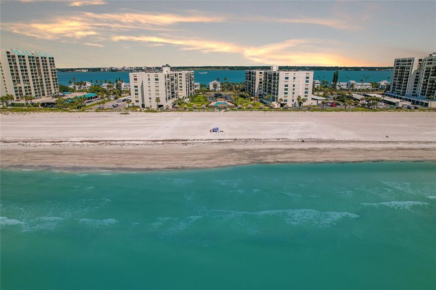 Trade the to-do list for endless sunshine at South Beach on Sand Key ~ the ultimate destination for effortless Florida beachfront living! This beautifully updated condo offers breathtaking views of both the Gulf and the Intracoastal Waterway, giving you the rare opportunity to enjoy stunning sunrises and unforgettable sunsets every single day. Step inside to a bright and open floor plan designed to maximize the sparkling blue water views from nearly every room. The beautifully appointed kitchen features granite countertops, tile backsplash, stainless steel appliances and an extended breakfast bar with seating for casual dining and entertaining. The spacious family room flows seamlessly to the oversized private balcony, where jaw-dropping panoramic views of the Gulf, Intracoastal waters and powdery white sandy coastline create the ultimate backdrop for relaxing or hosting guests. The spacious primary suite offers direct balcony access, dual closets and a spacious primary bath. The guest bedroom also features balcony access and beautiful water views, making every space in this home feel connected to the beauty of Sand Key. This condo has been thoughtfully updated with fresh interior paint, luxury vinyl plank flooring and professional luxury fabric blinds throughout (2026). Additional upgrades include a new hurricane-rated family room window, kitchen refrigerator and UV light for the AC (2025), new HVAC system, ceiling fans and replaced rollers on the patio hurricane shutters (2024), a new PGT slider door in the primary suite and high efficiency stacked washer and dryer (2023), plus a new water heater and updated closet doors (2022). Best of all, this incredible condo comes completely furnished so you can immediately start living your best beach life! South Beach on Sand Key is one of the Gulf Coast’s most desirable beachfront communities, offering direct access to award winning white sandy beaches just minutes from all the dining, entertainment and excitement of Clearwater Beach. This structurally sound building has passed all three condo inspections and maintains fully funded reserves, allowing you to invest with confidence. Residents enjoy resort style amenities including a heated waterfront  pool, poolside and beachside tiki huts, fitness center, elegant club room and 24 hour gated security. HOA fees include internet, cable, water, sewer, trash, exterior maintenance, building insurance, and outstanding community amenities. Experience the peaceful, upscale coastal lifestyle that makes Sand Key one of Florida’s true Gulf Coast gems!