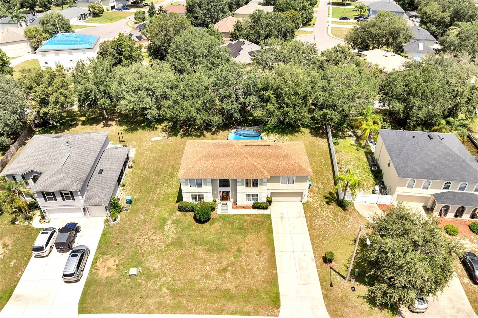 Seller Motivated!!! offering $5,000 —can be use toward rate buydown or closing costs!
This fully remodeled 5-bedroom, 2.5-bath home offers over 3,000 sqft of luxury living on a 0.39-acre lot with no rear neighbors. Features include 24” x 48” porcelain tile, wood flooring, Calacatta quartz countertops in kitchen and bathrooms, stainless steel appliances, freshly tiled showers, updated fixtures, and new interior paint. Roof replaced in 2021.
Buyer may continue renting to the current tenant if purchasing as an investment. Occupant currently paying $2,800/month. Lease ends at closing unless otherwise agreed. "A property ideally located between an established community and shopping centers- perfect for enjoying The Villages lifestyle, with all conveniences within easy reach"
Schedule your private tour today!
