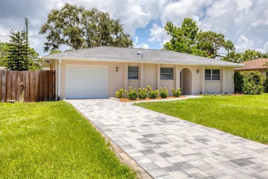 One or more photo(s) has been virtually staged. Discover a blend of convenience and comfort in this centrally located Sarasota home. Painted inside and out and a new paver driveway are some of the most recent updates. It is ideally just moments from downtown, the vibrant University Town Center (UTC) mall, major roadways like Interstate 75 and top-rated schools. This well-maintained residence offers a fantastic opportunity for first-time homebuyers, downsizers or investors seeking a move-in-ready property. Go inside and be greeted by a bright and airy interior, freshly painted throughout for a clean and modern aesthetic. The heart of the home is the recently updated kitchen, boasting a stylish tile backsplash, gleaming stainless steel appliances and elegant granite countertops. This complete kitchen renovation, finished in October 2023, provides a family-inspired space for creating memories. The spacious great room is a highlight. It features a stunning custom stone fireplace that creates an inviting focal point for cozy evenings. The open floor plan seamlessly connects the great room to the kitchen, maximizing space and promoting a fluid flow for daily living and entertaining. The home features two well-appointed bedrooms and two baths, ensuring comfortable accommodation for residents and guests alike. The primary bedroom offers a peaceful retreat, while the secondary bedroom provides versatility for a home office, guest room or child's bedroom. Beyond the interior, the property boasts a convenient one-car garage, complete with a washer and dryer, eliminating the need for costly laundry services. The sizeable backyard offers ample space for outdoor enjoyment, providing an ideal setting for pets to play or children to explore. The possibilities are endless, whether creating a vibrant garden, setting up a patio for relaxation or hosting summer barbecues. Enjoy peace of mind knowing the roof was replaced in 2018, a significant investment that ensures long-term protection and value. This exceptional property combines the best of Sarasota living – convenient location, updated features and a welcoming atmosphere. Don’t miss this opportunity to own a piece of Sarasota paradise. Schedule your showing today!
