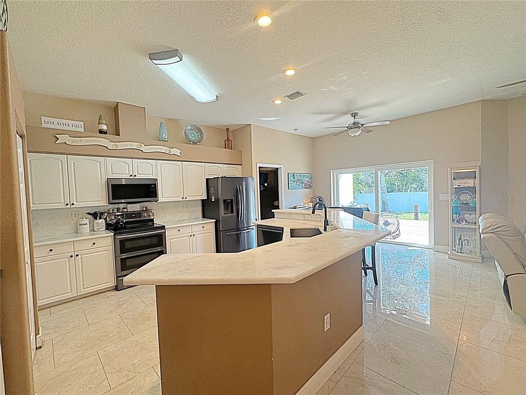 Photo of 1467 Watermill Circle, Tarpon Springs, FL 34689 (MLS # TB8479848)