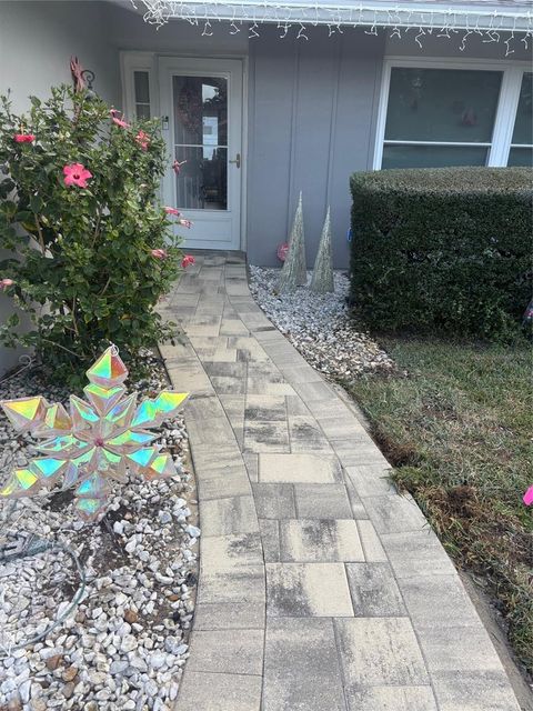 Photo of 13454 Hacienda Drive, Largo, FL 33774 (MLS # TB8463031)