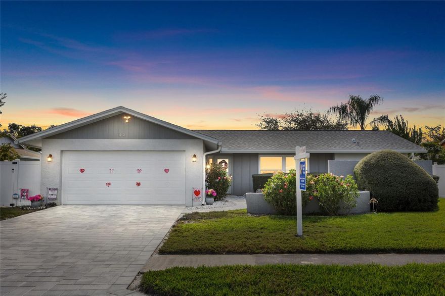 Welcome home!  Del Prado has an Optional HOA and is Short Term Rental friendly. Absolutely GORGEOUS, FULLY REMODELED, very spacious home in exclusive Del Prado subdivision in Largo. This split floor plan home is move-in ready with 3 bedrooms, 2 baths, huge dining room and living room and 2-car garage!! The kitchen is fully remodeled with granite countertops, tile backsplash and stainless steel appliances. The home has been freshly painted throughout the outside and inside.  It features new hurricane windows 2025, new roof 2024, new hurricane garage door 2025, new insulation in attic and new air ducts.  The large backyard is fully fenced with new pavers on the patio.  New pavers on the driveway 2025. Great location, only 5 mins from world famous beaches, restaurants and very close to Oakhurst Elementary. Schedule your showing today, it won’t last long!