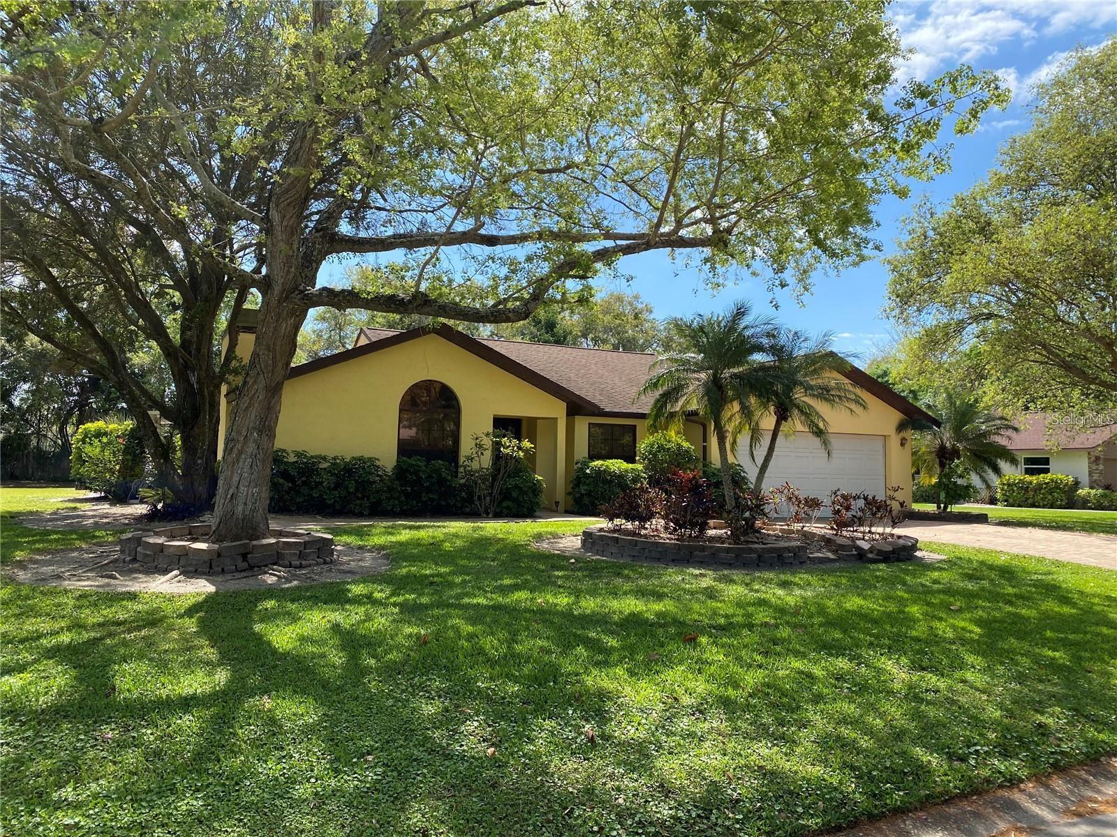 Are you looking for a home that offers space and privacy? This charming house on a half-acre lot near downtown features expansive brick paver decking surrounding a fenced-in pool area, perfect for relaxation and entertaining.
Inside, enjoy vaulted ceilings, a granite kitchen island, and real wood cabinets. The living room boasts a stunning arched window, a wood-burning fireplace, and a dry bar with a wine refrigerator. With tile flooring throughout and completely renovated bathrooms, maintenance is a breeze.
Lawn and pool care are included, making this an ideal place to call home.