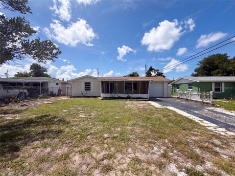 Photo of 4718 Trafford Road, Holiday, FL 34690 (MLS # O6436638)