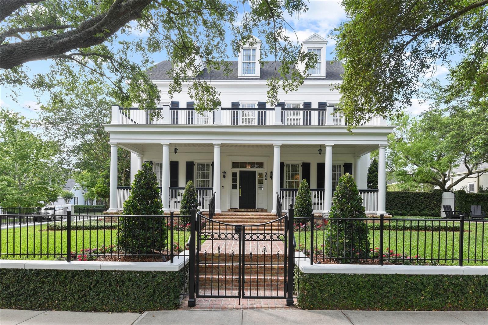 Presenting 4601 New Broad Street in Baldwin Park. This flagship estate was custom built by Derek Builders in collaboration with LRK Designs for the developer of Baldwin Park. This home commands attention perched on the 1/3-acre premier lot with views of the cascading waters of New Broad Street. Step in the epitome of luxury living boasting 6 bedrooms, 6 ½ baths and a sprawling 6220 square feet of meticulously crafted space including an expansive in-law suite. The outdoor oasis greets you with an outdoor kitchen, sparkling pool with sun shelf and fountain, artificial turf , and gorgeous landscaping for privacy. Extensive remodel in 2023. Complete renovation of the in-law suite to include kitchenette, custom bath, and vinyl plank flooring. Renovation to expand Primary bedroom to add sitting area, decorative custom shelves, expansive custom closet, and bath. The chef's kitchen includes a new Thermador double oven, Thermador gas stove, new Bosch dishwasher, GE monogram microwave and refrigerator. New exterior landscape and lighting design by Leaf landscape design: Artificial turf in rear yard with added drainage system. Japanese blueberry privacy hedge, mature crepe myrtles and bamboo trees planted with Mexican pebble beach rock beds. Chicago brick walkway to access front gate. Newly planted sod and plants in front yard. Stunning new high end light fixtures installed throughout. Painted inside and out. Exterior is waterproof elastomer paint with a 10 year warranty. Solid Red Oak flooring throughout sanded and refinished. New high end carpet in all bedrooms. New hot water heater. Full wet bar with designer sink and refrigeration added for 3rd floor entertainment area. WIFI capability for sound, temperature, and lighting. New alarm system for the entire home to include every entry and window. New gutters added. Newly added air conditioning to gracious 3 car garage and slip resistant tile flooring that is used in high end dealerships. New roof in 2022. This spectacular home is walking distance to everything Baldwin Park has to offer including dining, shopping and entertainment.