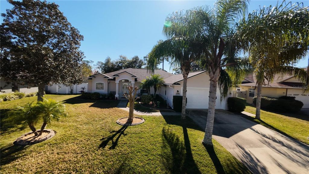 Photo of 114 Foxhall Lane, Palm Coast, FL 32137 (MLS # FC315364)