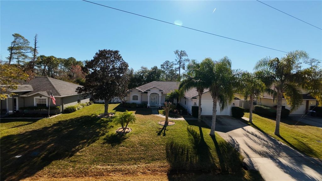Photo of 114 Foxhall Lane, Palm Coast, FL 32137 (MLS # FC315364)