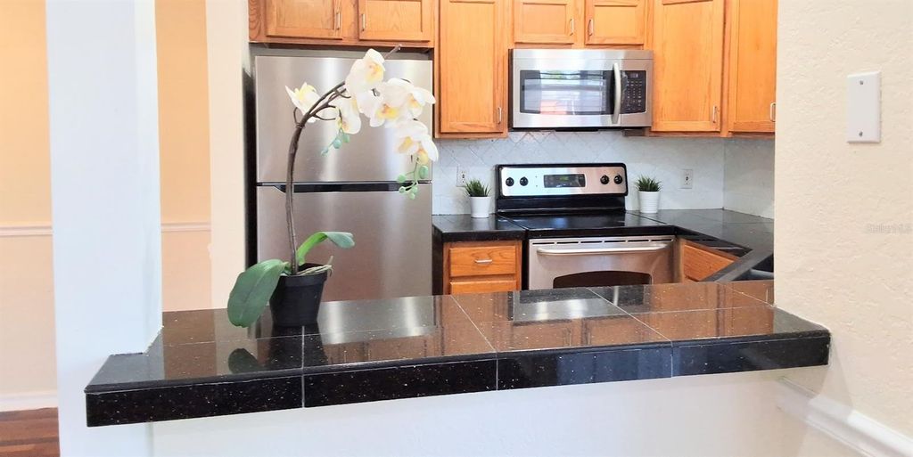Photo of 2905 Antique Oaks Circle #6, Winter Park, FL 32792 (MLS # O6354114)