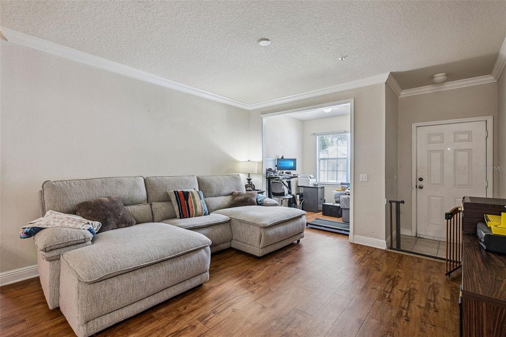 Photo of 200 Southern Pecan Circle #104, Winter Garden, FL 34787 (MLS # O6424749)
