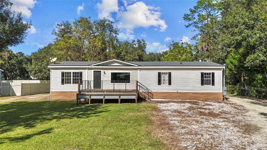 Photo of 25301 Celestial Street, Christmas, FL 32709 (MLS # O6353052)