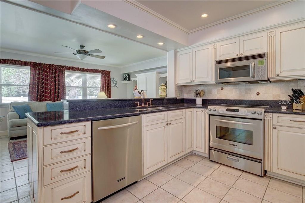 Photo of 2395 6th Avenue SW, Largo, FL 33770 (MLS # TB8455764)