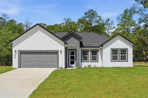 Photo of 226 E Caldwell Drive, Dunnellon, FL 34434 (MLS # O6407186)