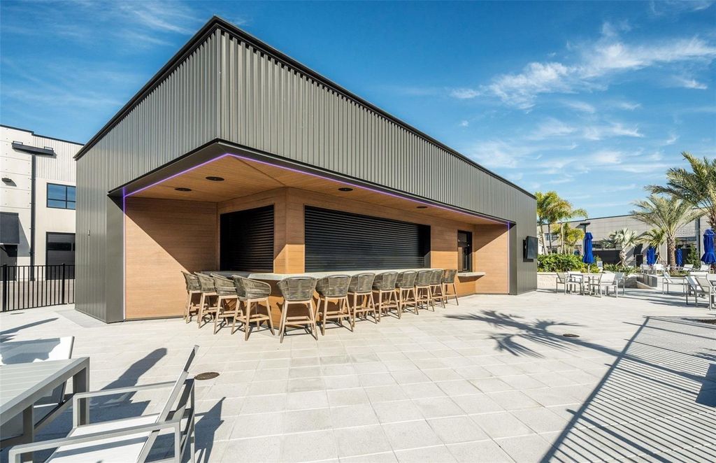 Photo of 6500 Motor Enclave Way #1111, Tampa, FL 33610 (MLS # TB8470536)