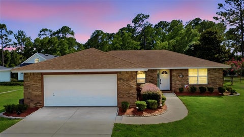 Photo of 687 Winterberry Trail, Deland, FL 32724 (MLS # V4949823)