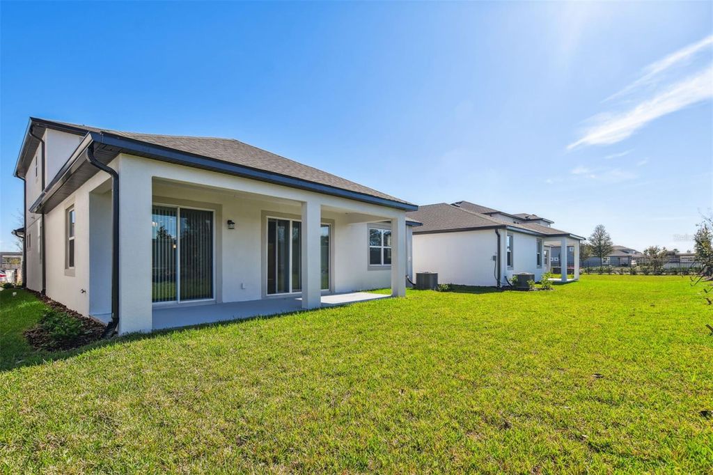 Photo of 7699 Bronze Oak Drive, Wesley Chapel, FL 33545 (MLS # T3513128)