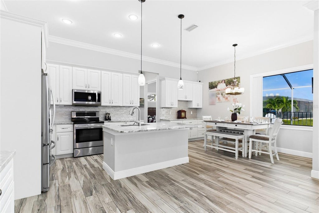 Photo of 1909 SW 45th Street, Cape Coral, FL 33914 (MLS # C7530770)