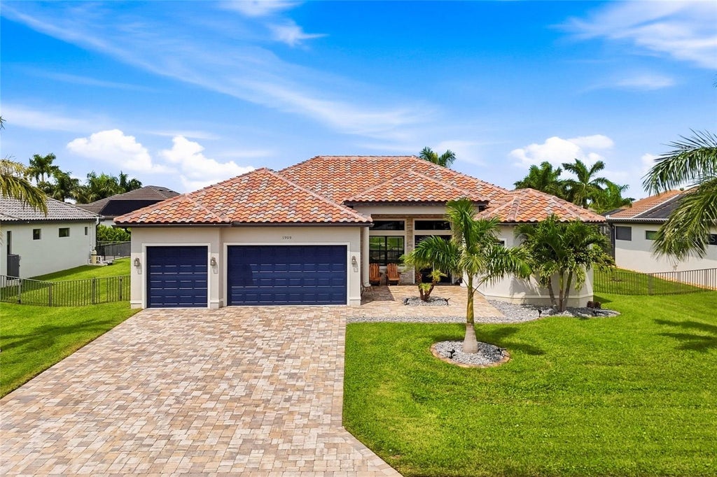 Photo of 1909 SW 45th Street, Cape Coral, FL 33914 (MLS # C7530770)