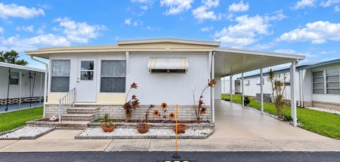 Photo of 41 Pindo Palm Street E #41, Largo, FL 33770 (MLS # TB8550915)