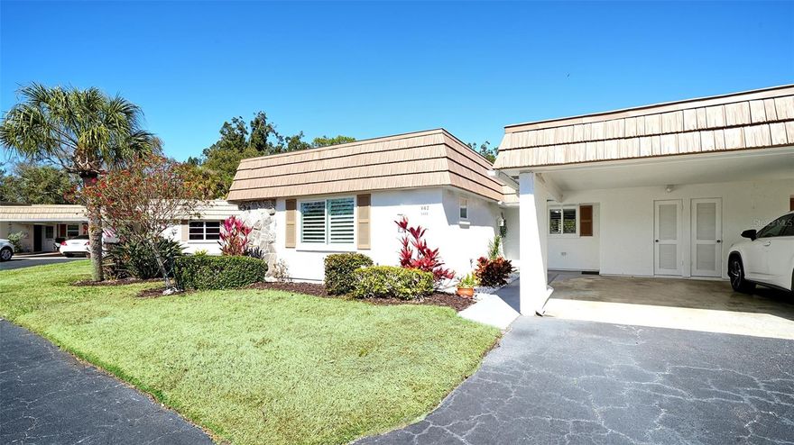 Welcome to Strathmore Riverside, a highly desirable 55+ waterfront community on Phillippi Creek with access to the Gulf of Mexico and just 1.9 miles from the Siesta Key South Bridge. World-famous Siesta Key beaches and Detwiler's Farm Market are only minutes away.
This beautifully updated 2-bedroom, 2-bath villa offers 1,120 square feet under air with a desirable split floor plan. Luxury vinyl plank flooring runs throughout, complemented by high baseboards, recessed lighting, upgraded ceiling fans, and quality doors and hardware.
The renovated kitchen features quartz countertops, modern wood cabinetry, stainless steel appliances, with a beautiful island for entertaining. Recessed tray ceiling and coordinating finishes create a seamless flow into the dining and living areas. Access to your own outdoor grilling area is conveniently located just outside. Enjoy a quiet, private backyard with expansive open green space and no homes directly behind you, offering added privacy and peaceful views.
Both bathrooms have been upgraded with quartz countertops, updated vanities, and modern fixtures. Custom built-in plantation shutters gives you lots of privacy through out the home. Windows have also been replaced. The attached laundry room is located under the covered carport and includes additional storage space. 
Community amenities include a heated pool, clubhouse, fitness center, sauna, library, recreational facilities, and an active social calendar. Boat slips are available for an additional fee. (waiting list may apply). Enjoy low-maintenance living, with basic cable, water, trash, sewer included in your monthly dues.