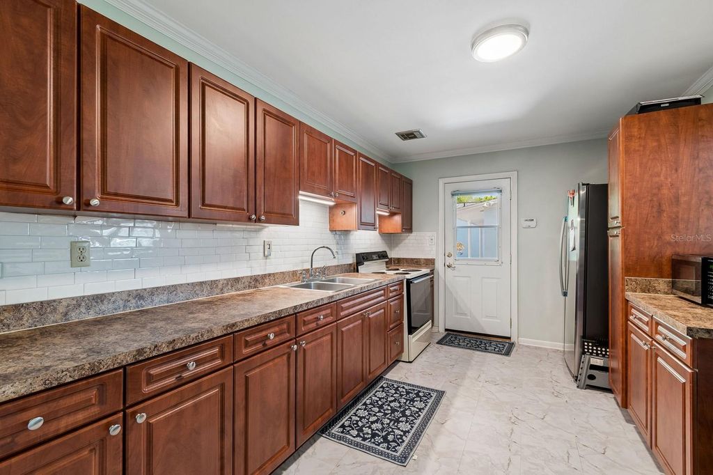 Photo of 4519 S Cooper Place, Tampa, FL 33611 (MLS # TB8492181)