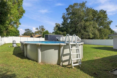 Tiny photo for 21485 SW Raintree Street, Dunnellon, FL 34431 (MLS # OM734840)