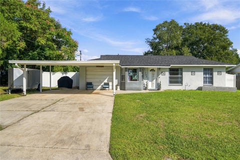 Photo of 21485 SW Raintree Street, Dunnellon, FL 34431 (MLS # OM734840)
