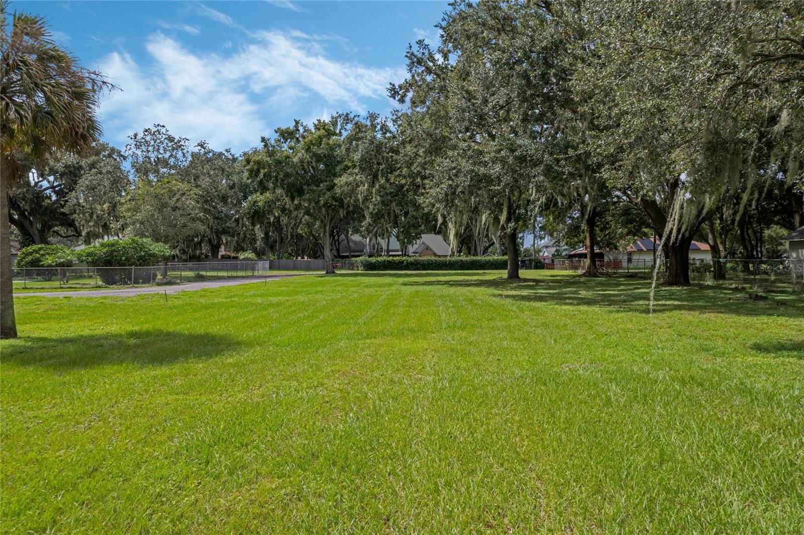 No HOA! Build your new dream home on the last vacant lot in Hillcrest's established Winter Garden community. This 0.48 lot is flat and clear on a quiet, dead-end street in Hillcrest. Custom home plans are available, or choose your floor plan and builder for a home up to a 65-foot wide. Enjoy living minutes from DOWNTOWN WINTER GARDEN's charming historic district, Plant Street Market Place, and the Splash Pad. Launch your boat from the public ramp at nearby Newton Park to enjoy the natural beauty of Lake Apopka and the Dora Chain of Lakes. 80% lot financing is available through a preferred lender. Build your new dream home on a quiet, dead-end street in a mature neighborhood in desirable Winter Garden, Florida.