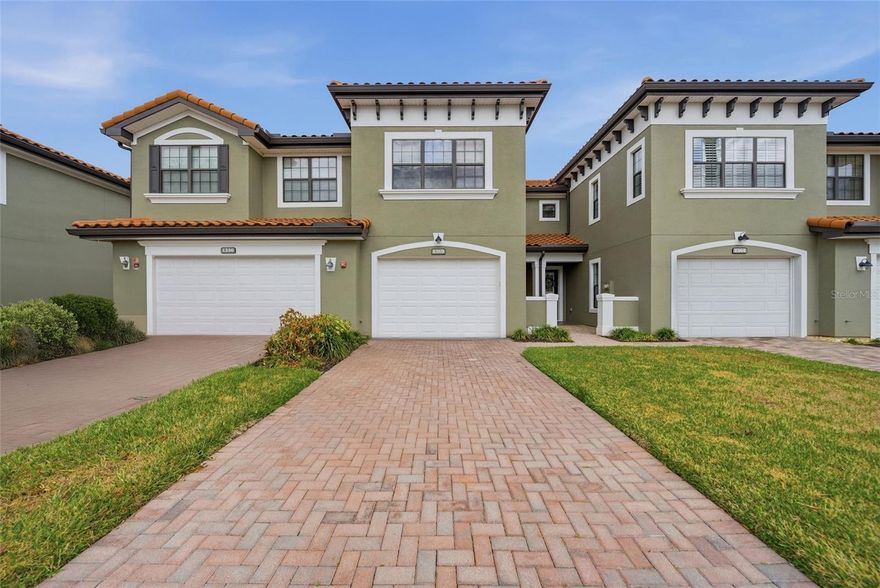 Welcome to your dream home nestled within the prestigious Tuscawilla gated community of The Greens at Tuscawilla! This meticulously designed two-bedroom townhome offers a perfect blend of sophistication and comfort, promising a lifestyle of convenience and luxury.  Step inside and be greeted by an expansive open floor plan that exudes warmth and elegance. The seamless flow between the living, dining, and kitchen areas creates a perfect setting for both everyday living and entertaining guests.  Large windows allow natural light to bathe the interiors, enhancing the welcoming ambiance of this exceptional home.  Experience luxury with two spacious primary bedrooms, each featuring an ensuite bathroom for ultimate privacy and convenience. One suite boasts a bathroom complete with a soaking tub, separate shower and generous walk-in closet complete with custom built-ins, providing ample storage space and a touch of elegance.  The high ceilings enhance the sense of space and airiness throughout the home.  This maintenance free townhome is crafted with high-quality block construction on both stories, energy efficient windows and a brick paver driveway ensuring durability and peace of mind. The tile barreled roof not only adds to the home's aesthetic appeal but also enhances its resilience against the elements. 

Situated in the heart of Tuscawilla, this home offers the perfect balance of tranquility and accessibility. Enjoy the benefits of residing in a well-maintained, matured landscaped secure community with a cart path leading  to the Tuscawilla Country Club while being just moments away from shopping, dining, and top-rated schools.  This home also features a screened patio, 1.5 car garage with golf cart charging station. 
Don’t miss the opportunity to make this exceptional townhome your own. Experience the best of Tuscawilla living today!