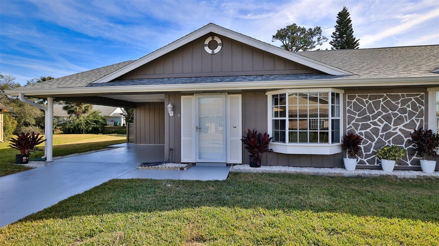 POOL CERTIFICATE TO HEATED COMMUNITY POOL AVAILABLE OUTSIDE OF CLOSING!   Beautifully updated and well-maintained golf villa is ready to move in! NEW Roof 2021, NEW Air Conditioner System 2023, NEW Water Heater 2021, NEW Kitchen Appliances, Disposal, counter tops and can lights 2022, in renovated kitchen that has been opened up to become part of living area, instead of a workstation. Vaulted ceiling in living/dining area, as well as bay window to bring in the outdoors and brighten the area with lots of natural light. Waterproof vinyl planking in living areas, and guest bedroom, with tile in kitchen and bathrooms, and new carpet in master suite that features a walk-in closet and Brand NEW en-suite Master Bath. Hall Bath updated with NEW bathroom cabinet, countertop and fixtures. Freshly painted interior and exterior, including the driveway and 19 x 14 carport. French doors take you out to spacious 11.7 x 13 screen porch, where you will enjoy water view of canal, cool breezes and morning sun, as well as the waterfowl that frequent it. Seller has done everything he would want done if he was to live in this lovely home, just right for a second home, a retirement home, or to simply downsize in. Affordable HOA dues provide sprinkler system and irrigation water, termite bond and common area maintenance. Home incurred minor water intrusion from rear, just enough to wet carpet, which was quickly dealt with, as owner was present. Centrally located and close to everything, a bike ride away from historic Canal Street stores, restaurants, art shows, and museums. Eclectic beachside Flagler Avenue and the beach are but an 8 minute ride away. Nestled between 2 golf courses, and within walking distance of community heated pool that is available by optional membership. Pool membership certificate available for purchase outside of closing, if desired. ;Water: City