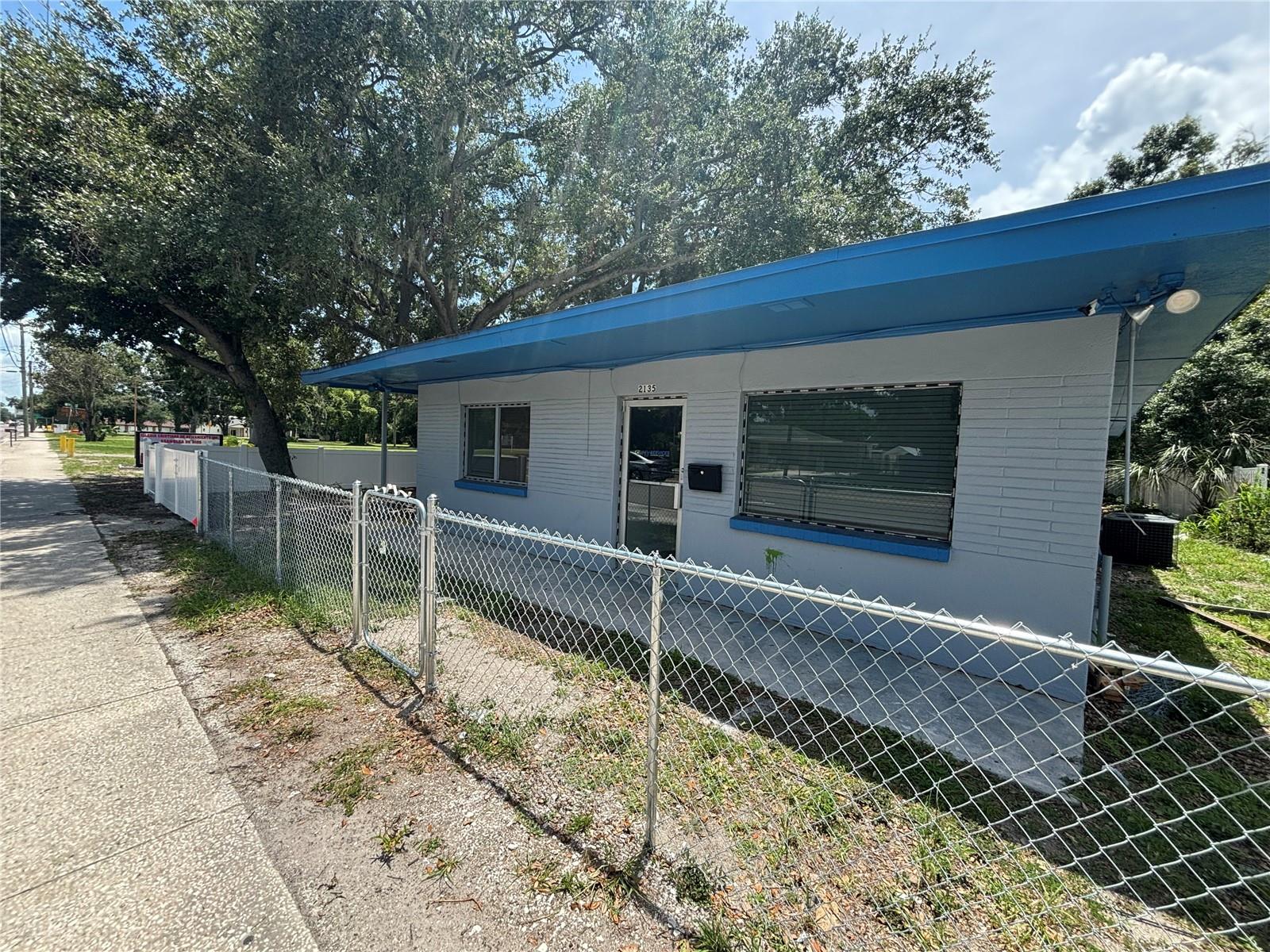 Welcome to 2135 S 78th St, Tampa, FL 33619, an exceptional office space opportunity perfectly located on a busy thoroughfare in the growing Palm River area. This versatile building is designed to meet the needs of a variety of professional uses, offering both functionality and comfort in a well-maintained setting.
Inside, you’ll find an open and inviting front floor plan that’s ideal for a welcoming reception area, showroom, or collaborative workspace. Toward the back, there are two private offices that provide quiet areas for meetings, management, or focused work. The suite also features a dedicated kitchen area equipped with a refrigerator and sink, making it easy for staff to enjoy meals or coffee breaks on-site. Two well-appointed bathrooms add to the convenience for both employees and clients.
The interior boasts updated fixtures throughout, giving the space a fresh, modern feel that’s ready for immediate occupancy. Outside, the property offers plenty of onsite parking to accommodate your staff and visitors, along with secure gated access for added peace of mind after hours.
Located on S 78th Street, this property benefits from excellent visibility and steady drive-by traffic, making it a great spot for businesses that want to attract local clients. Its strategic position provides easy access to major routes, including I-75, the Lee Roy Selmon Expressway, and US-301, allowing for quick commutes and convenient connections to downtown Tampa and surrounding areas.
Whether you’re an established business ready to expand, a startup looking for an affordable headquarters, or a professional service provider seeking a well-located office, this property checks all the boxes. Take advantage of this unique opportunity to lease a flexible office space that combines modern updates, practical amenities, and a prime Tampa location.