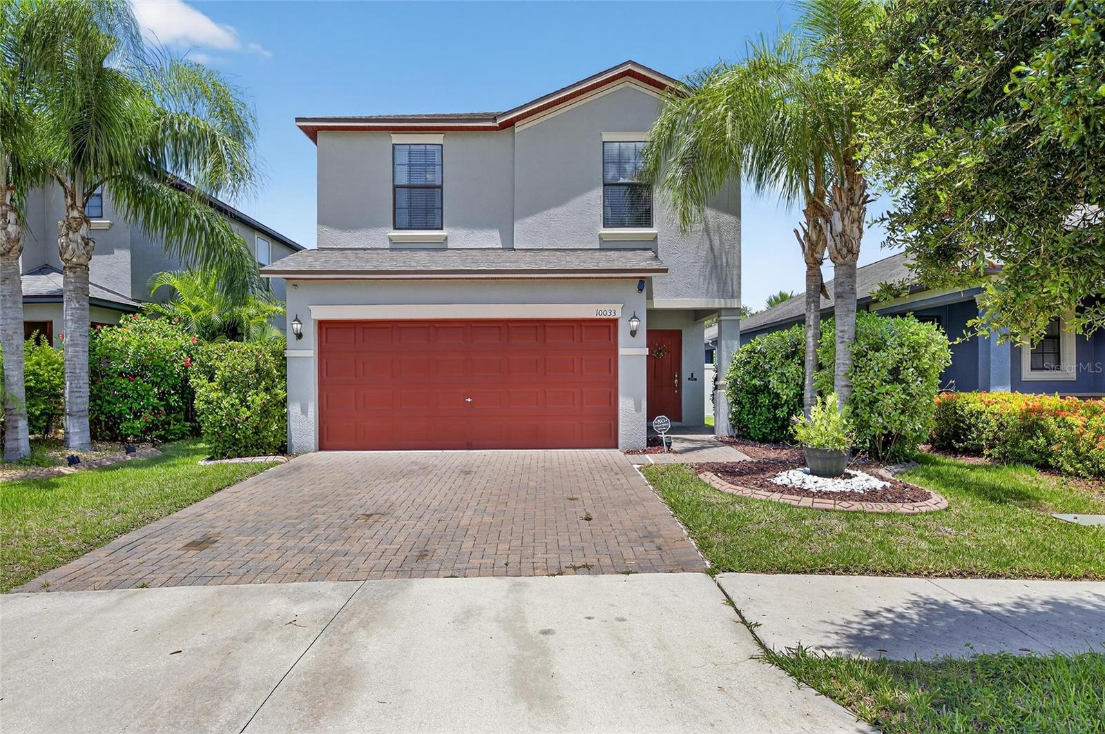 Welcome to this well maintained single family home located in the highly sought after Belmont community in Ruskin, FL. This 4 bedroom, 2.5 bathroom property offers a bright and spacious open floor plan perfect for modern living. The interior features ceramic tile flooring in common areas, a spacious kitchen with wood cabinetry, granite countertops, stainless steel appliances, and a central island ideal for casual dining and entertaining. The primary suite includes a walk in closet and an en suite bathroom with dual sinks and a glass enclosed shower. The three additional bedrooms are located separately, providing privacy and comfort for family or guests. The home is equipped with central air conditioning and energy efficient windows throughout. The exterior boasts a beautifully landscaped front yard, a two car garage with a paved driveway, and a covered lanai overlooking a fully fenced backyard, perfect for outdoor gatherings, play, or pets. The Belmont community offers fantastic amenities including a resort style pool, playgrounds, sports courts, and walking trails. Conveniently located just minutes from US 301 and I 75, this home offers easy access to Tampa, beaches, shopping, dining, and top rated schools. Don’t miss out on this wonderful opportunity to own a home in a growing and vibrant area. Schedule your private showing today!