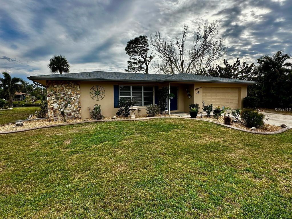 Photo of 18393 Hottelet Circle, Port Charlotte, FL 33948 (MLS # C7516021)