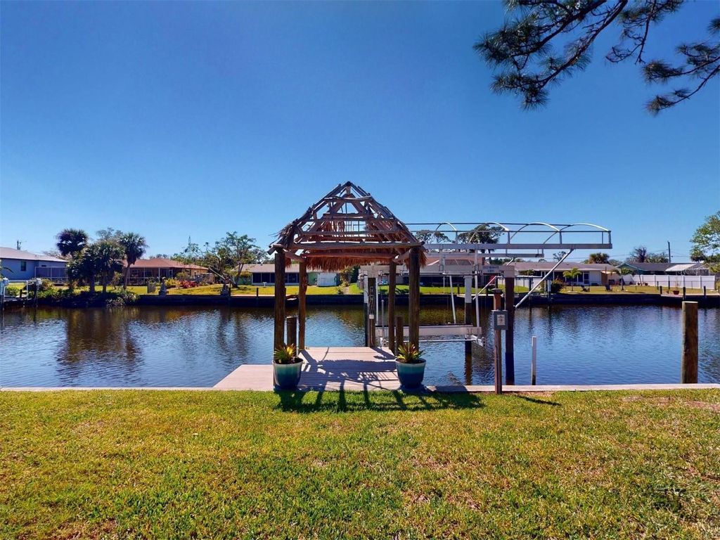 Photo of 18393 Hottelet Circle, Port Charlotte, FL 33948 (MLS # C7516021)