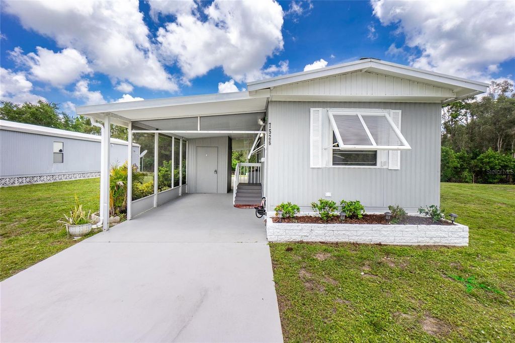 Photo of 7526 Silage Circle, Port Charlotte, FL 33981 (MLS # C7527514)