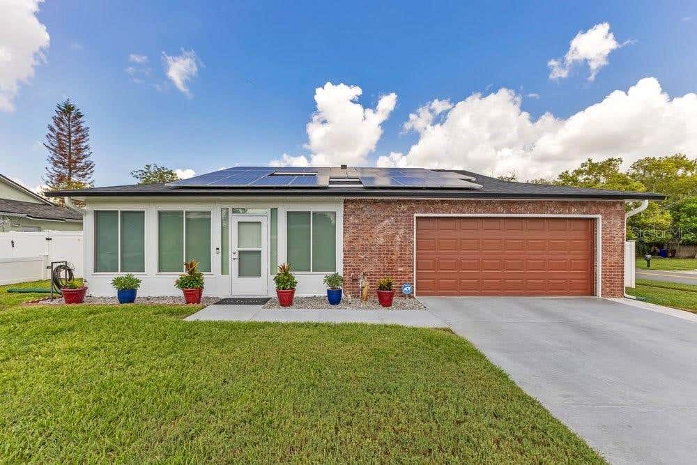 Photo of 2462 Mill Run Boulevard, Kissimmee, FL 34744 (MLS # O6418912)