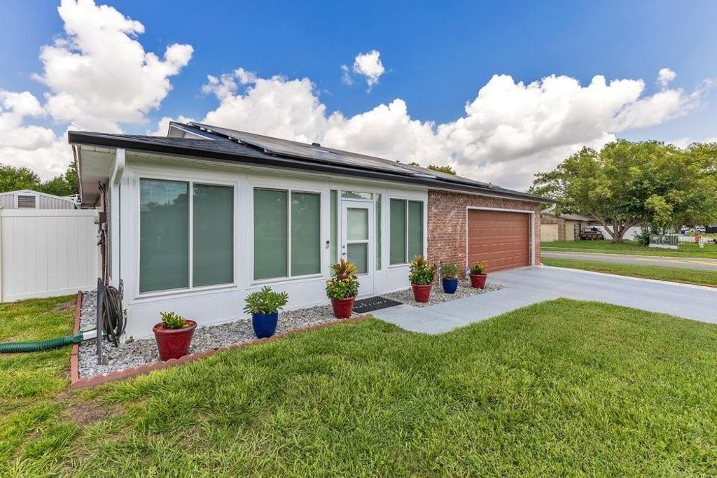 Photo of 2462 Mill Run Boulevard, Kissimmee, FL 34744 (MLS # O6418912)