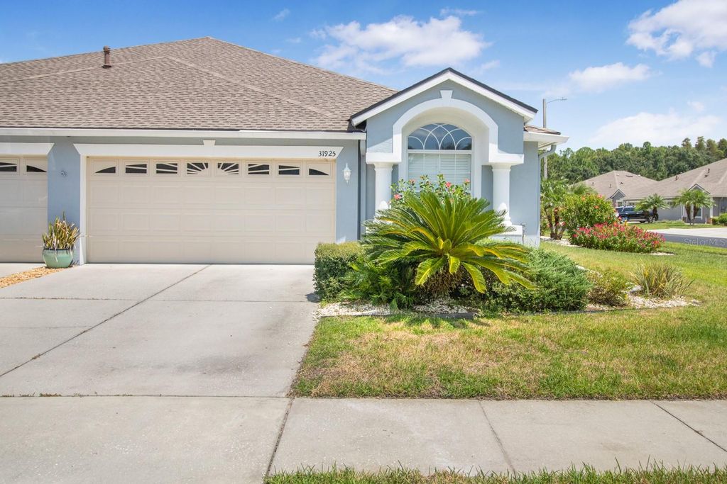 Photo of 31925 Turkeyhill Drive, Wesley Chapel, FL 33543 (MLS # TB8357966)